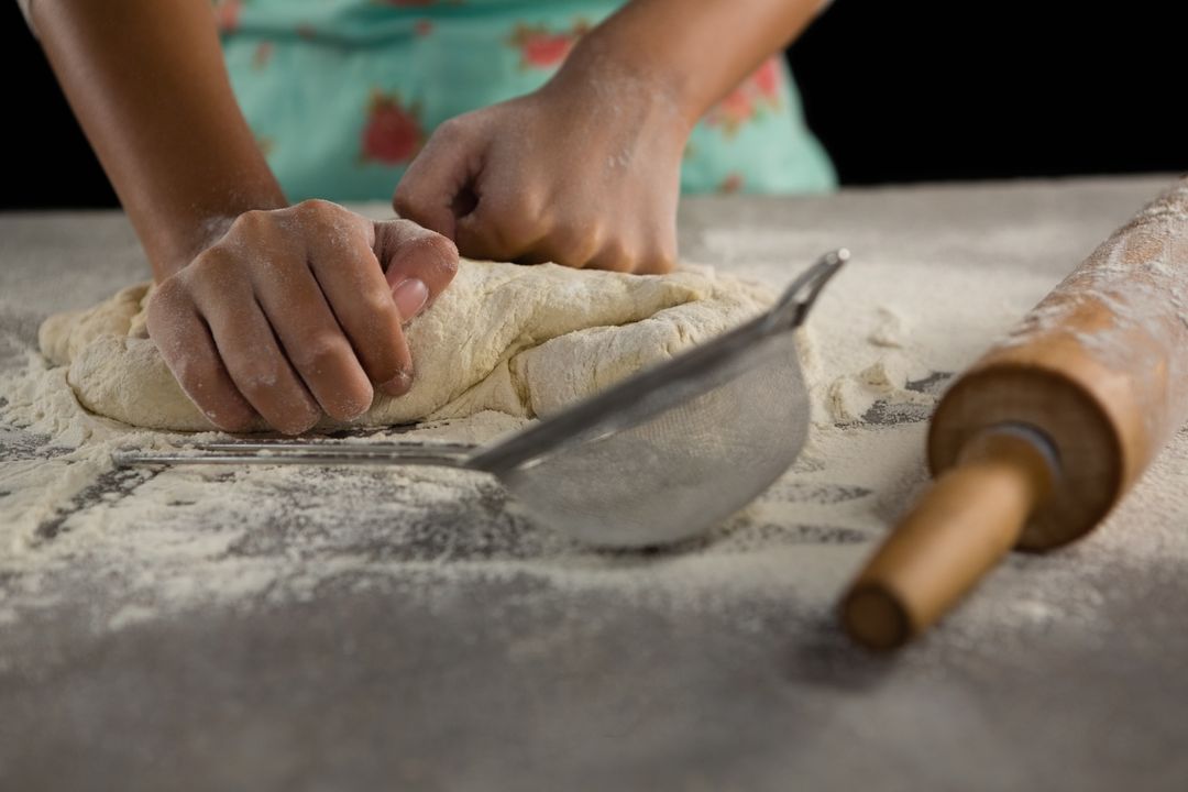 Woman kneading a dough - Free Images, Stock Photos and Pictures on Pikwizard.com