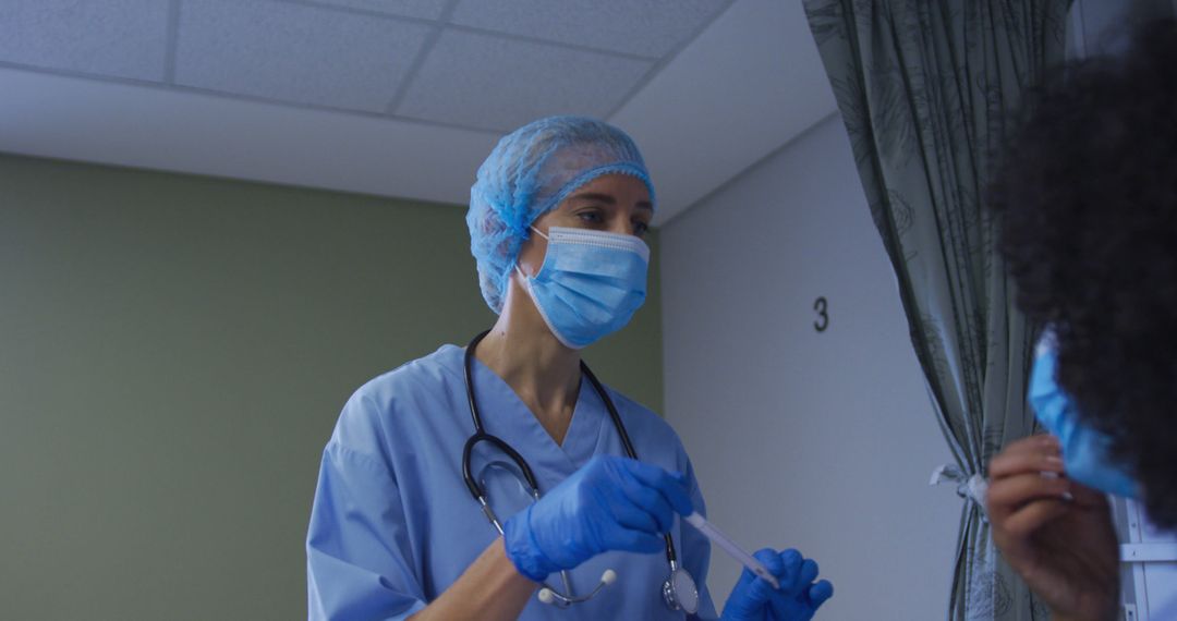 Female Nurse Wearing Scrubs and Mask Administering Medical Test - Free Images, Stock Photos and Pictures on Pikwizard.com