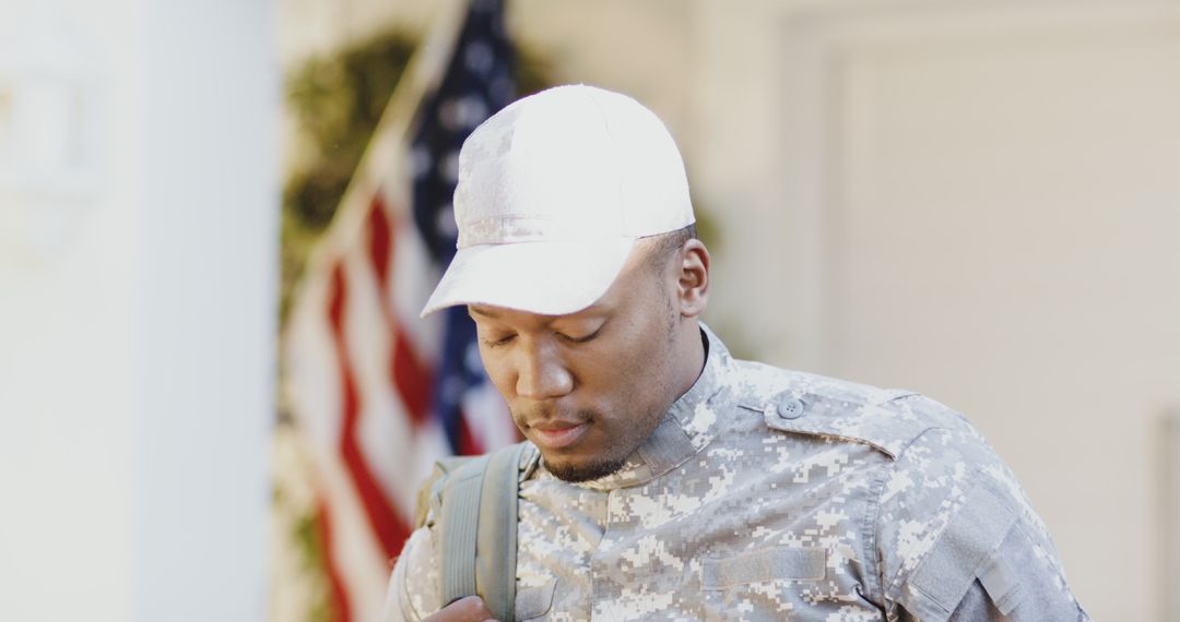 African American Soldier with Backpack Standing Outdoors - Free Images, Stock Photos and Pictures on Pikwizard.com