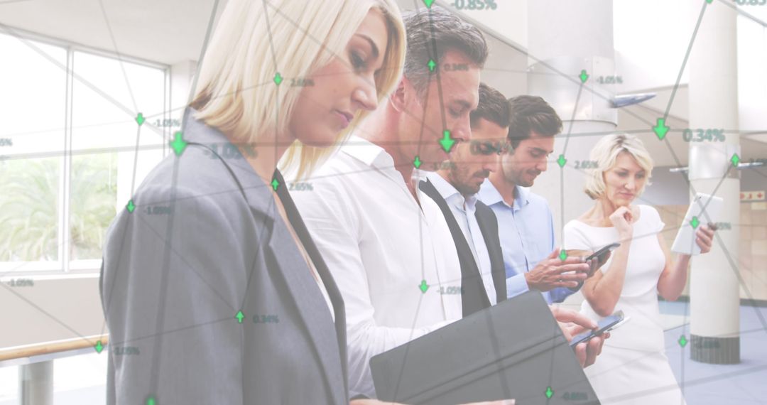 Diverse Professionals Analyzing Network Data on Devices