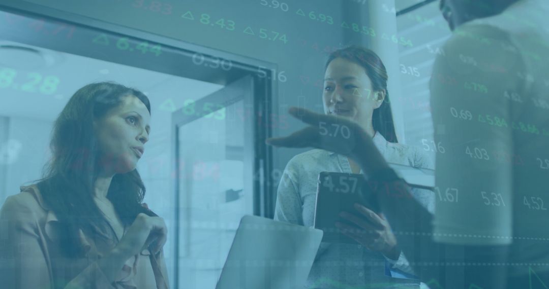 Multiethnic Group Discussing Financial Data in Modern Office