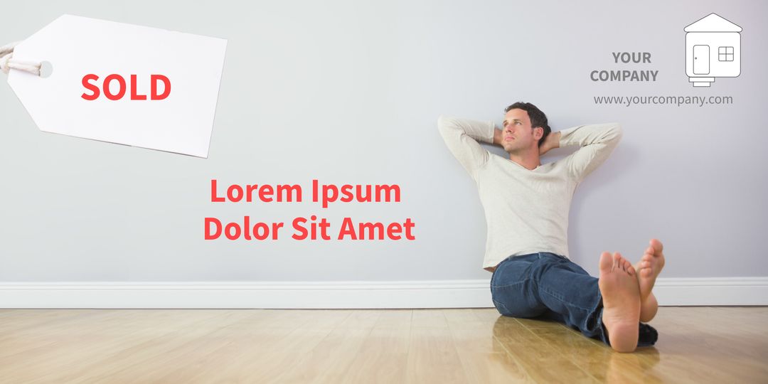 Relaxed Man in Empty Room Next to Sold Sign
