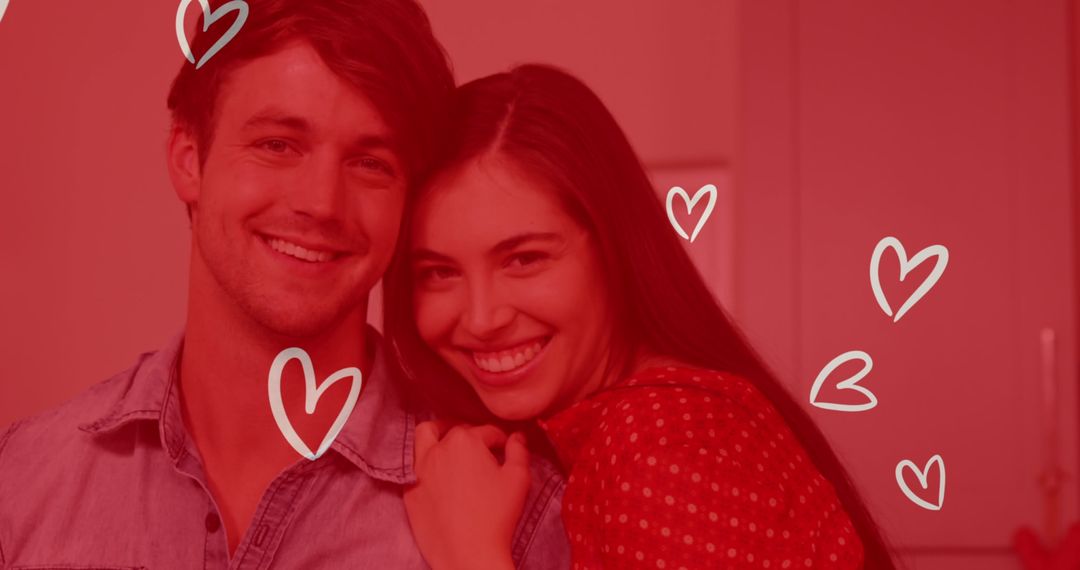 Smiling Couple Embracing with Romantic Heart Overlay