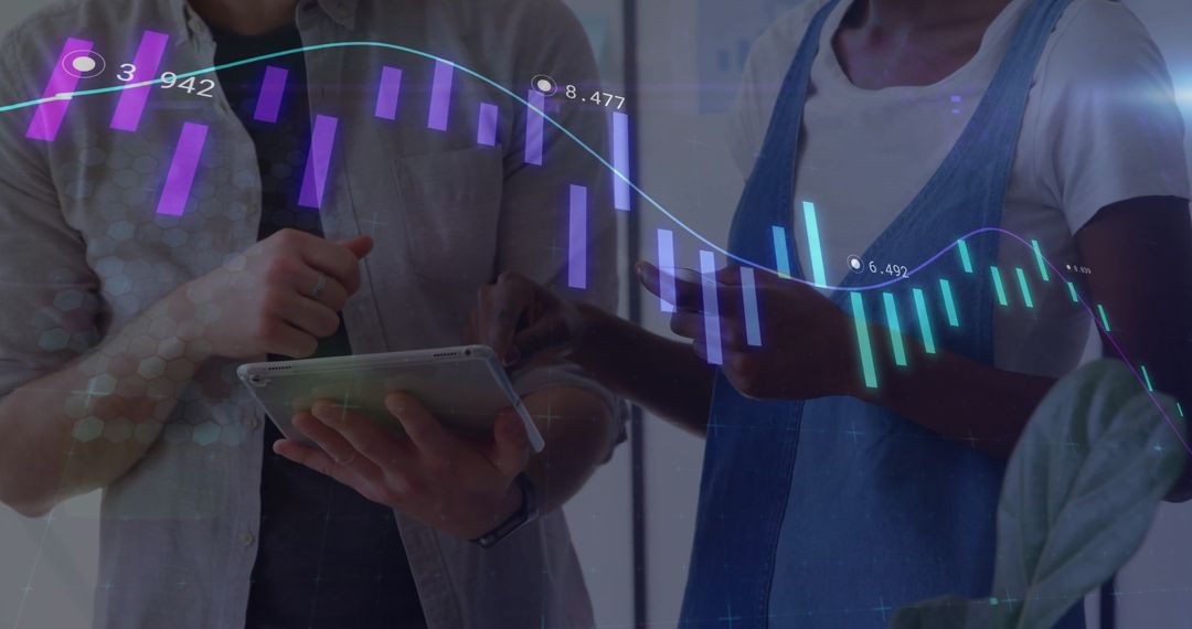 Business Finance Analysis with Colleagues Using Tablet