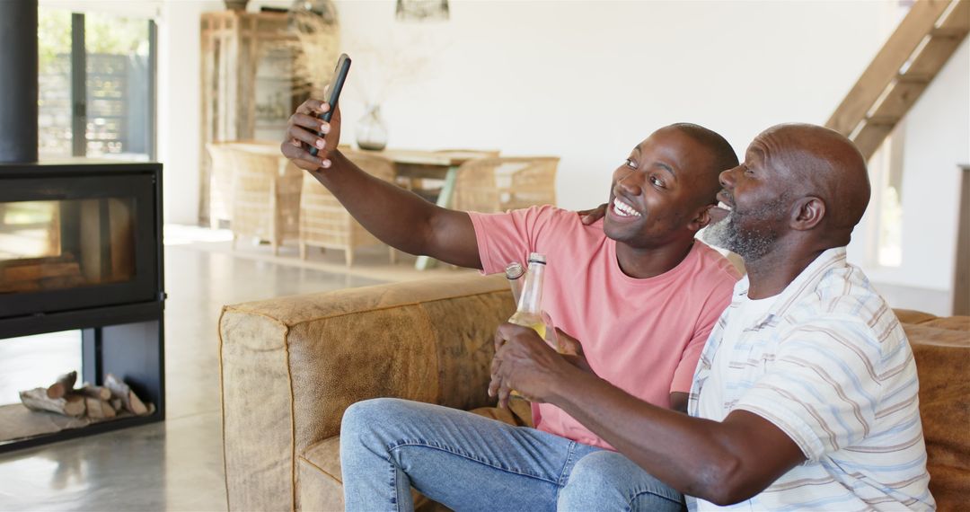Father-Son Bonding Over Beer Capturing Memories with Selfie