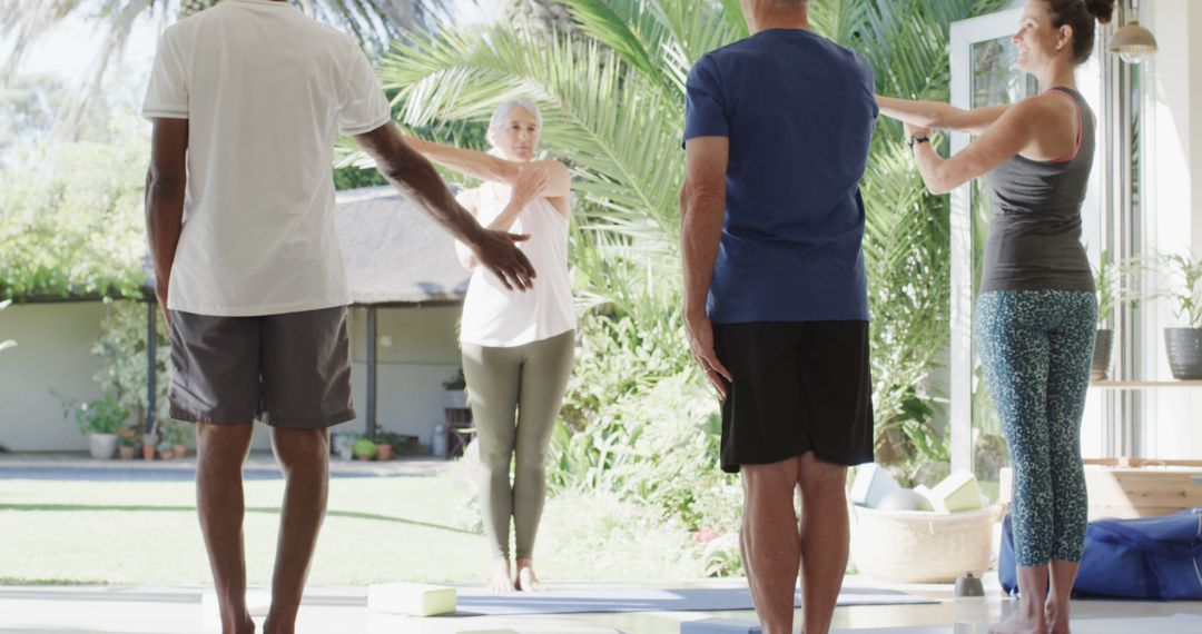 Group of Seniors Engaging in Outdoor Stretching Exercises - Free Images, Stock Photos and Pictures on Pikwizard.com