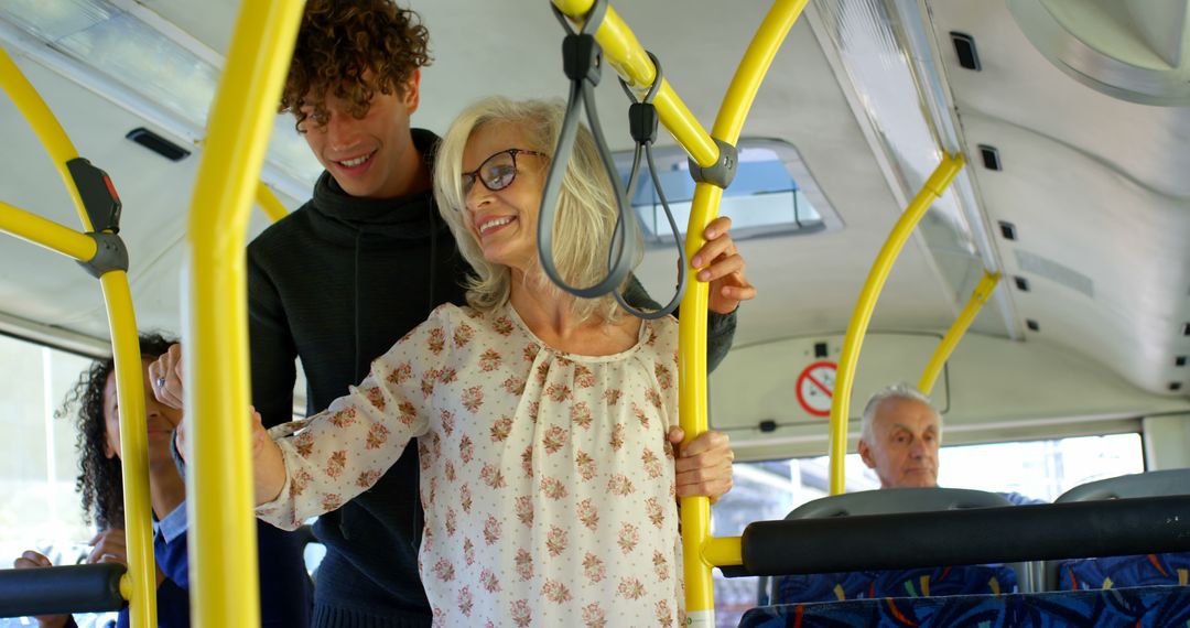 Elderly Woman Assisted by Young Man on Bus - Free Images, Stock Photos and Pictures on Pikwizard.com