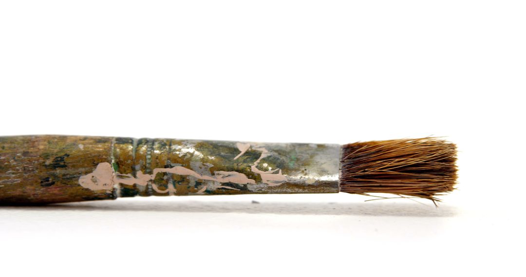 Old Bristle Paintbrush Isolated on Brown Wooden Handle - Free Images, Stock Photos and Pictures on Pikwizard.com