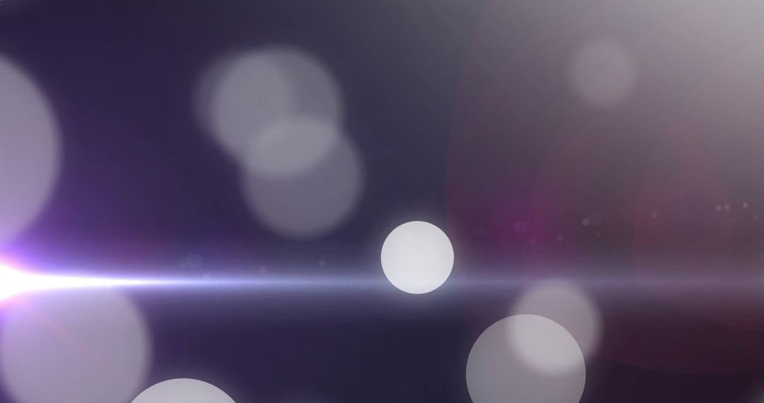 Abstract Floating Light Spots on Dark Background