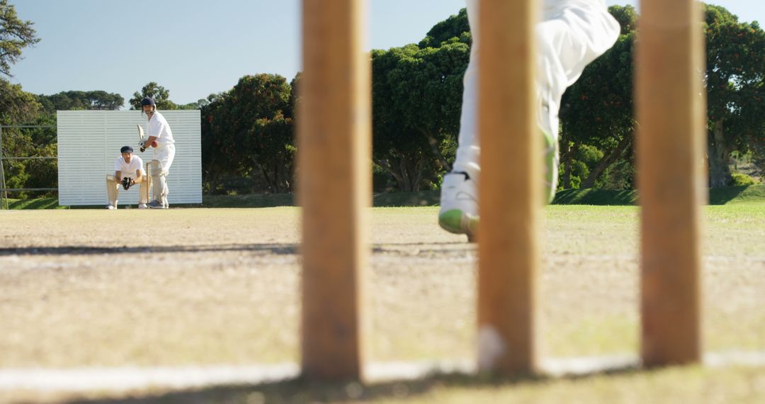 Batsman and Wicketkeeper in Action on Cricket Field - Free Images, Stock Photos and Pictures on Pikwizard.com