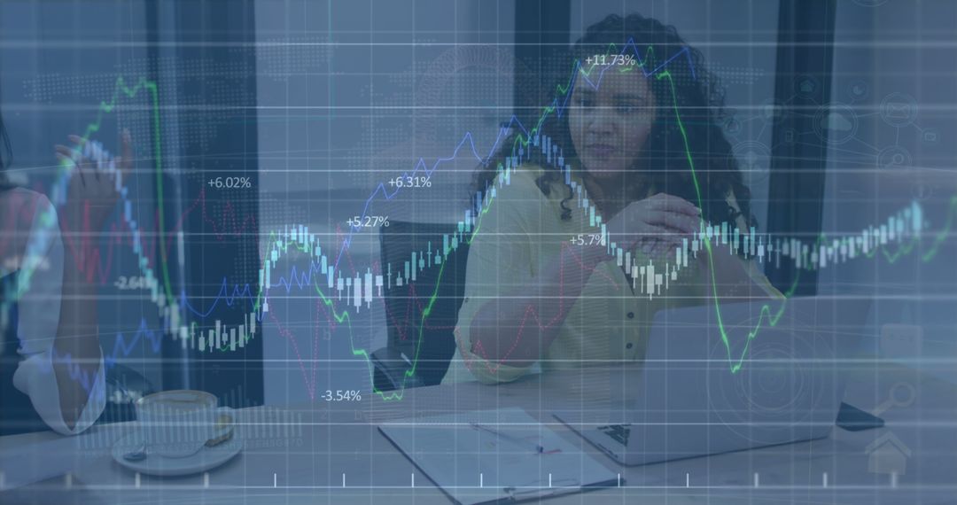 Businesswoman Analyzing Stock Market Trends with Laptop - Free Images, Stock Photos and Pictures on Pikwizard.com