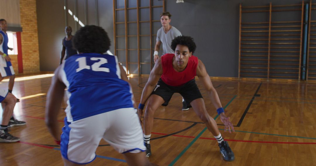 Intense Indoor Basketball Scrimmage with Team Strategy