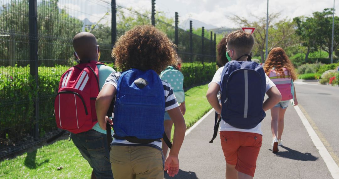 Group of Diverse Children Walking to School with Backpacks - Free Images, Stock Photos and Pictures on Pikwizard.com