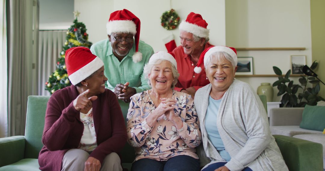 Diverse Group of Smiling Seniors Celebrating Christmas Together - Free Images, Stock Photos and Pictures on Pikwizard.com