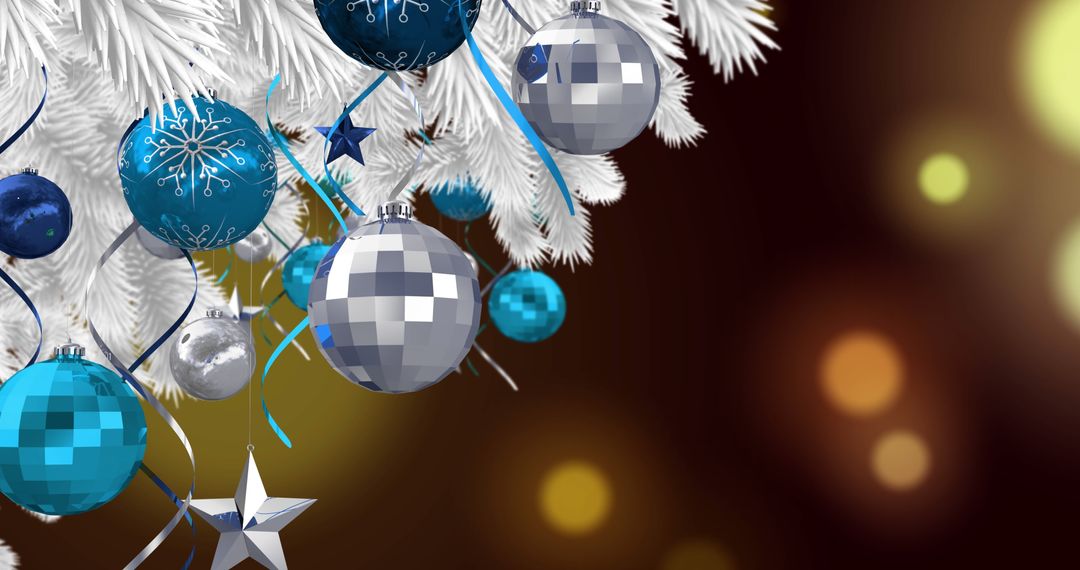 Festive Blue and Silver Christmas Decorations on White Tree
