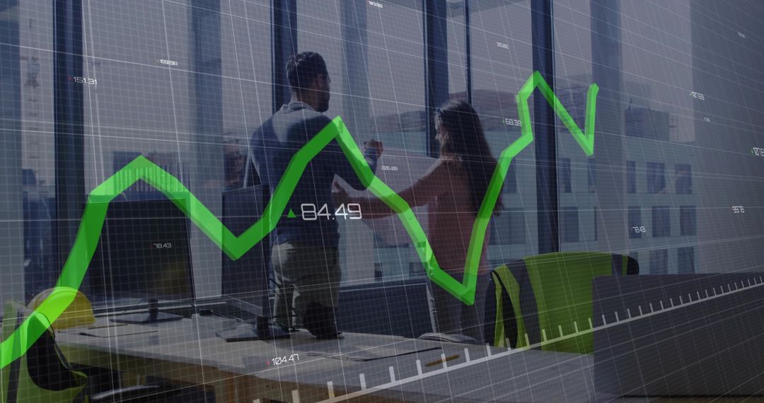 Business Colleagues Analyzing Growth Chart in Modern Office Environment