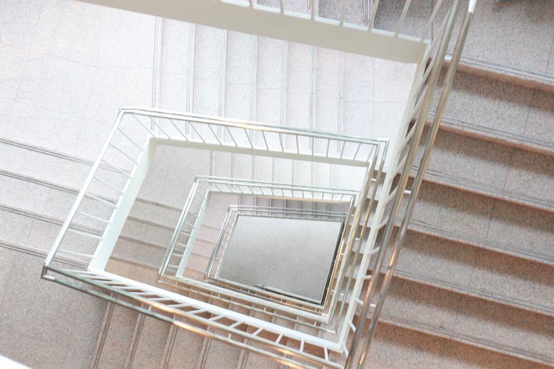 Abstract View of Spiral Staircase from Above - Free Images, Stock Photos and Pictures on Pikwizard.com