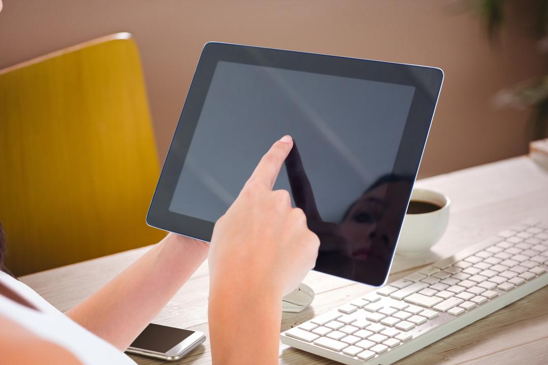 Close-up of Woman Using Tablet with Reflective Screen - Free Images, Stock Photos and Pictures on Pikwizard.com