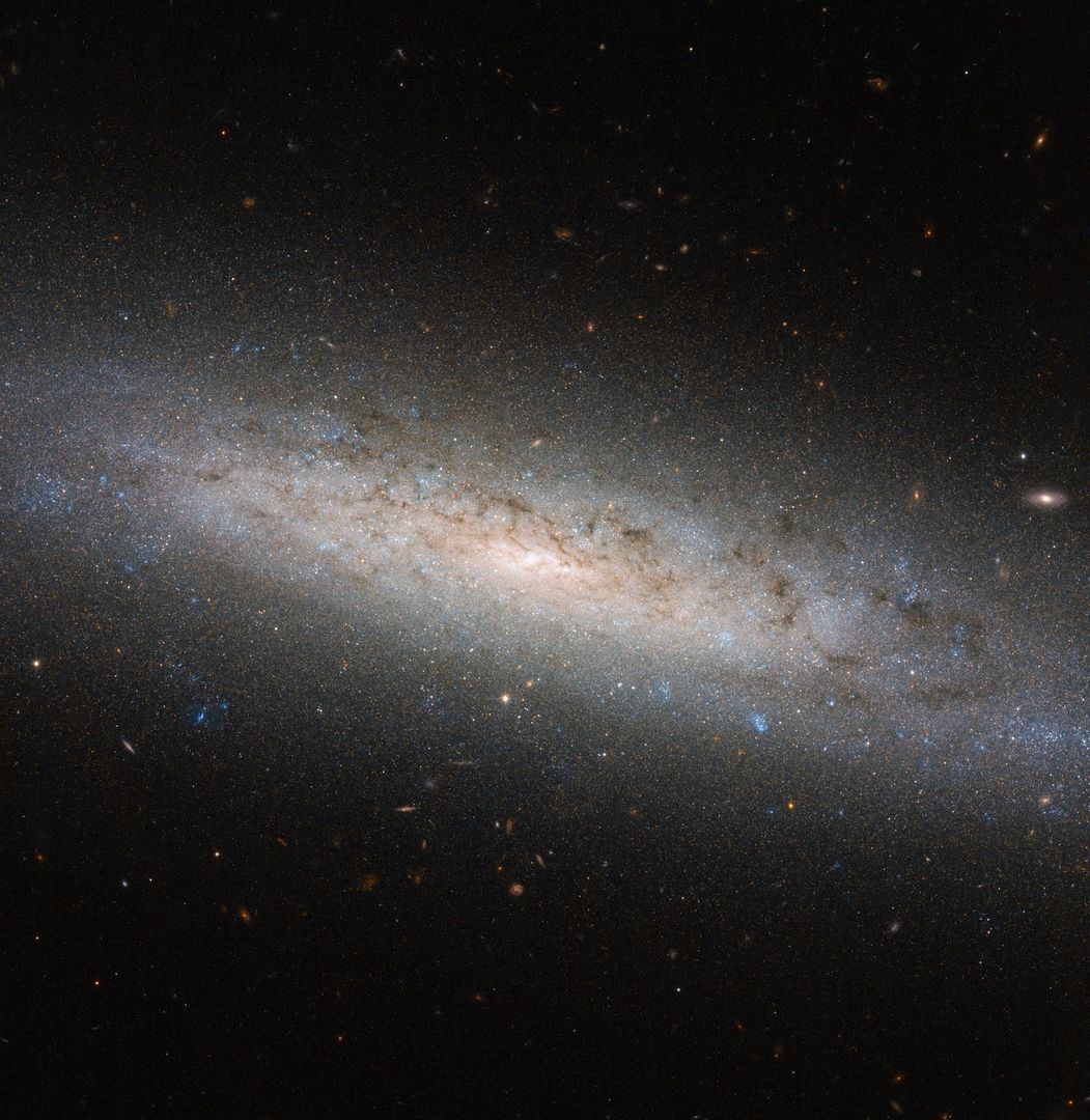 Hubble Explores the Hidden Dark Side of a Spiral Galaxy - Free Images, Stock Photos and Pictures on Pikwizard.com