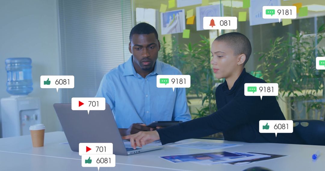 Business Team Analyzing Social Media Metrics on Devices in Collaborative Meeting