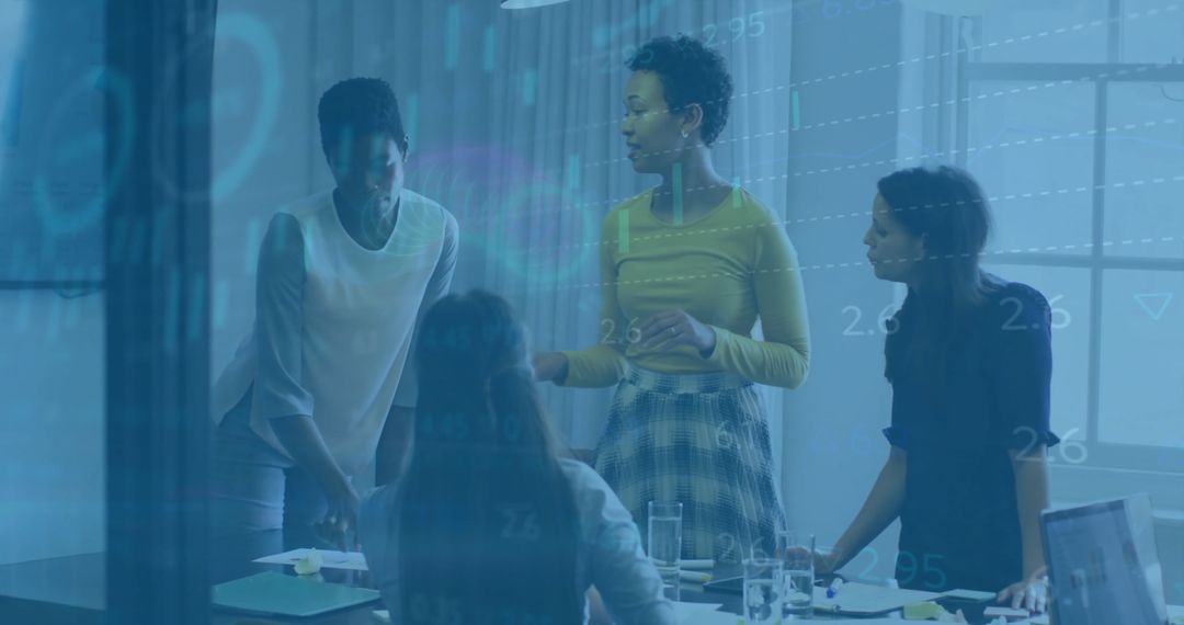 Professional Team Collaborating on Financial Data in Modern Office