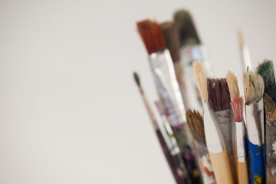 Varieties of paint brushes in jar - Free Images, Stock Photos and Pictures on Pikwizard.com