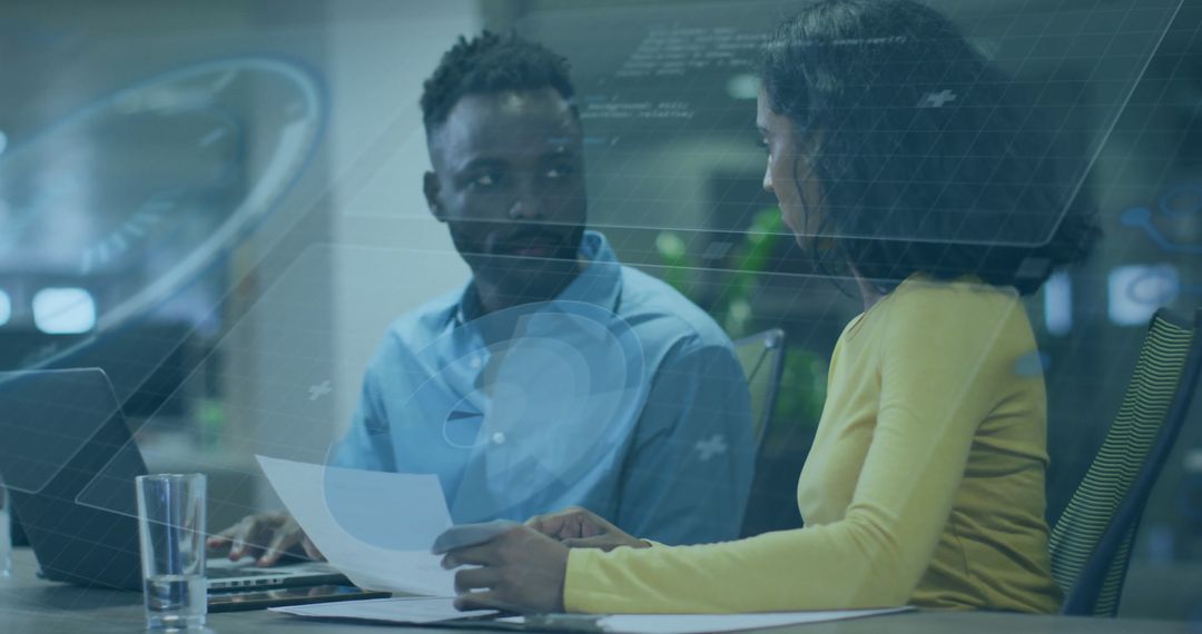 Digital Analysis Discussion with Diverse Colleagues in Office