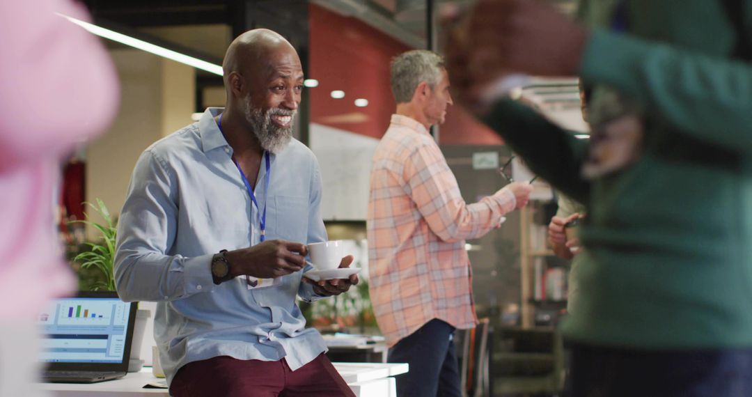 Smiling Professional Enjoying Coffee During Work Break in Modern Office