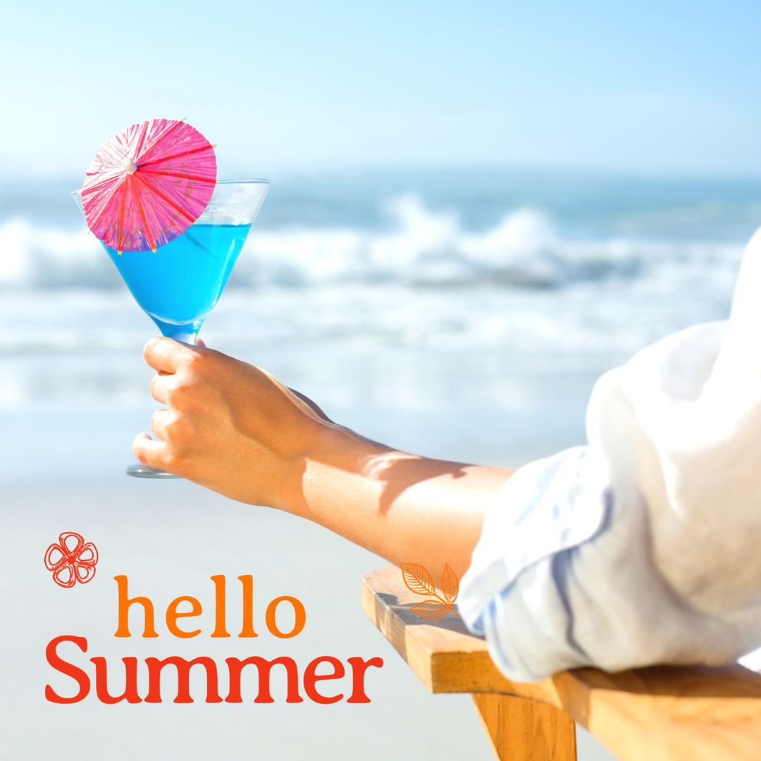 Summer Relaxation with Refreshing Blue Cocktail by Beach