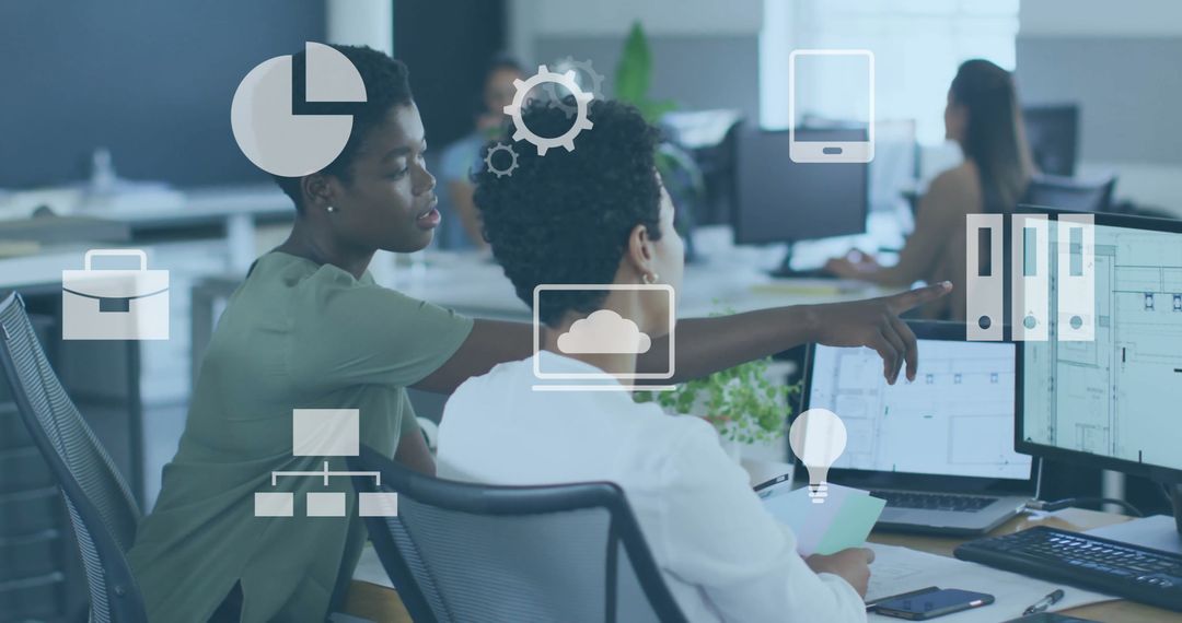 Professionals Collaborating with Business Technology in Modern Office