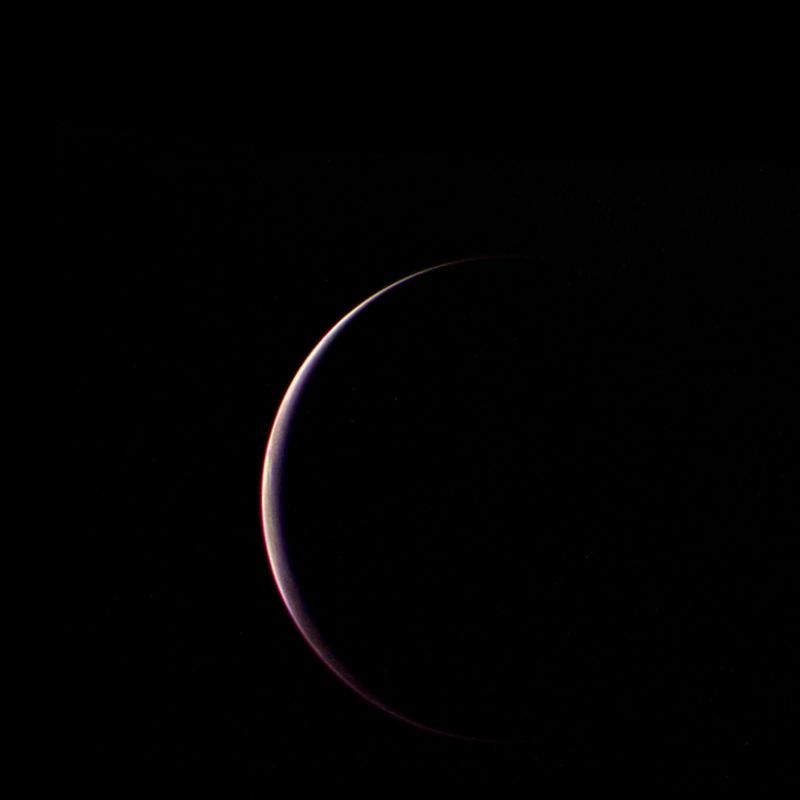 Crescent Triton Captured by Voyager 2 in 1989 - Free Images, Stock Photos and Pictures on Pikwizard.com