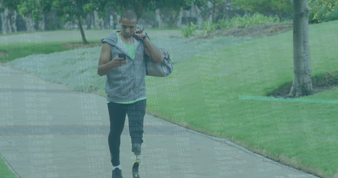 Athlete with Prosthetic Leg Exploring Park While Speaking on Smartphone