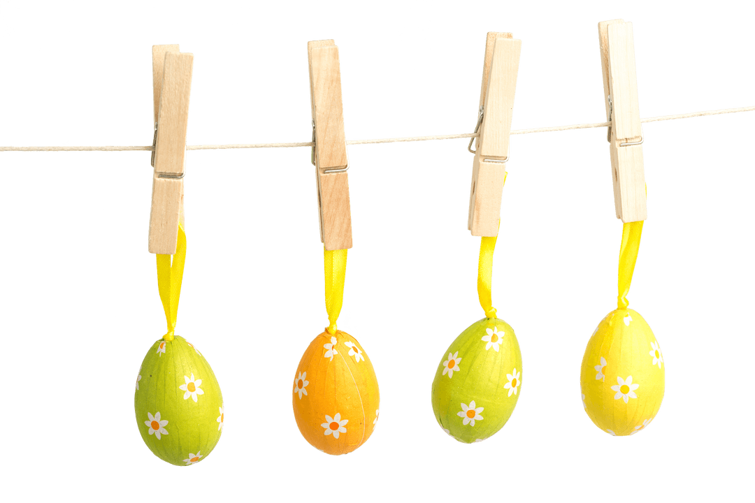 Vibrant Easter Eggs Hanging on Transparent Background