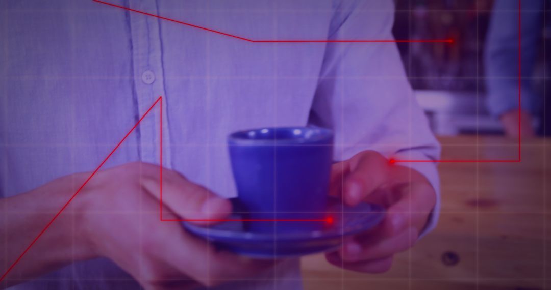 Chef Holding Cup with Assistance in Café Ambiance