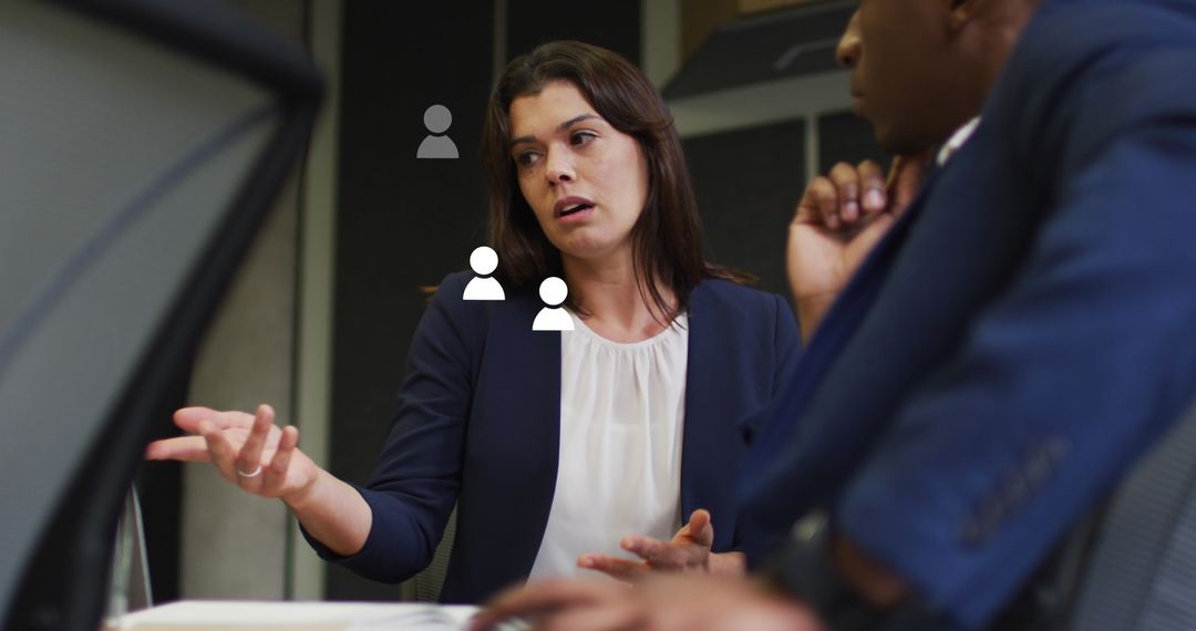 Diverse Professionals Discussing Ideas with Digital Media Icons Overlay