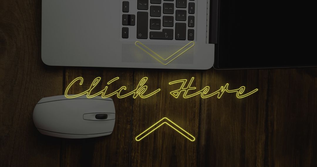 Mouse and Laptop with Click Here Sign