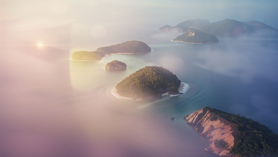 Serene Aerial View of Tropical Islands with Hazy Lens Flare