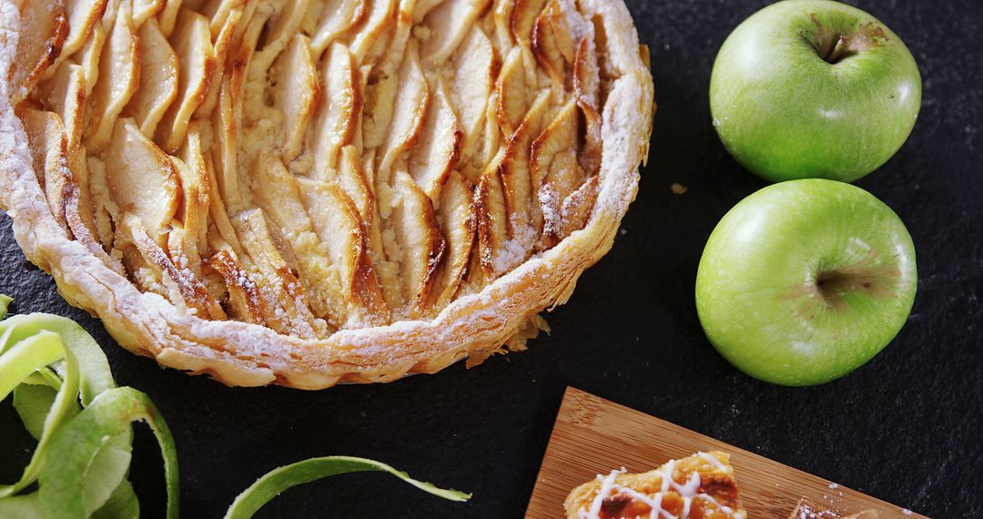 Freshly Baked Apple Pie with Green Apples on Dark Background - Free Images, Stock Photos and Pictures on Pikwizard.com