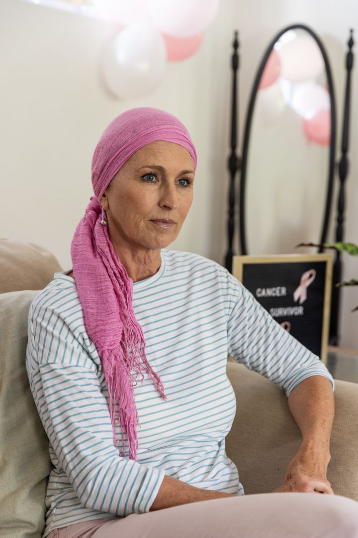 Senior Cancer Survivor in Home Setting Reflecting Resilience