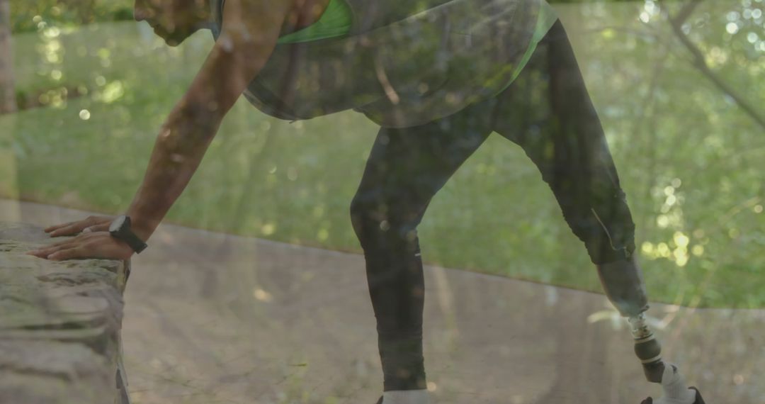 Athlete With Prosthetic Leg Stretching During Outdoor Workout - Free Images, Stock Photos and Pictures on Pikwizard.com