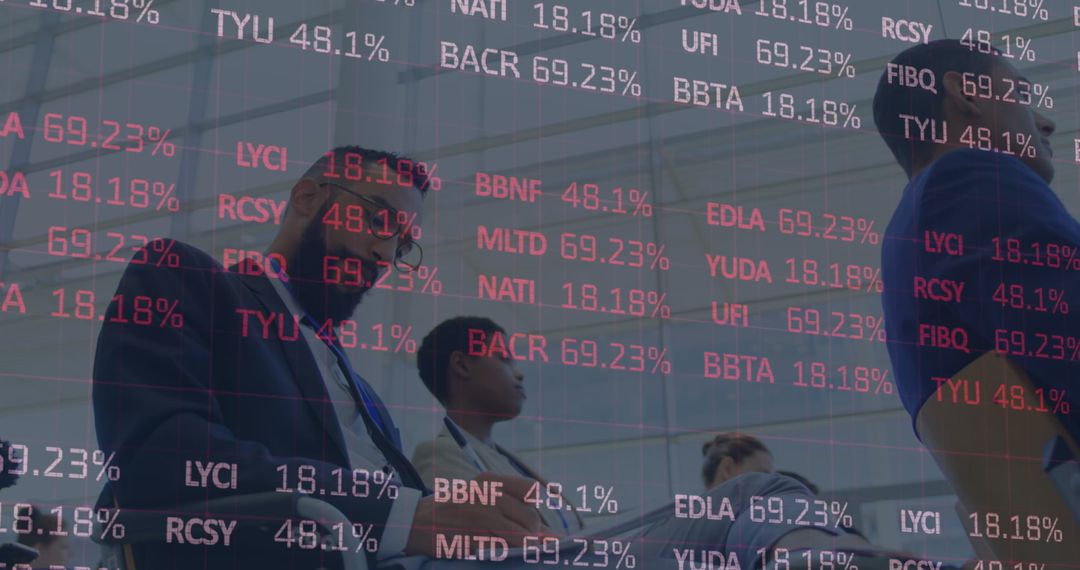 Business Executives Analyzing Data with Digital Stock Charts