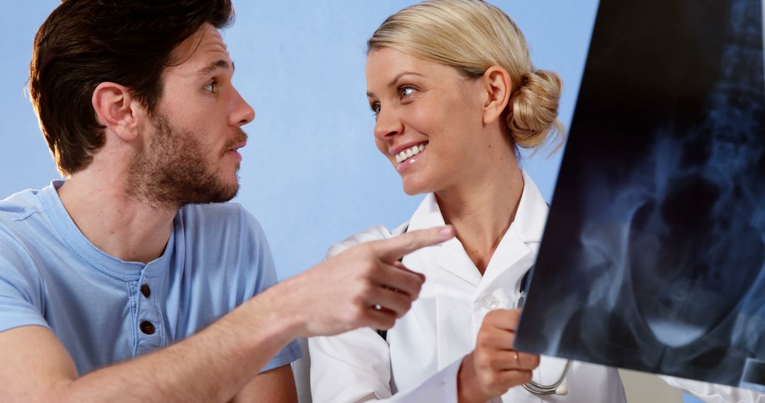 Patient Discussing X-ray Results with Female Doctor - Free Images, Stock Photos and Pictures on Pikwizard.com