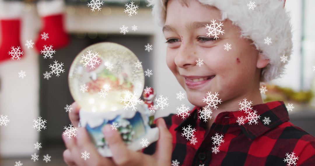 Joyful Child Holding Snow Globe in Festive Setting with Falling Snowflakes