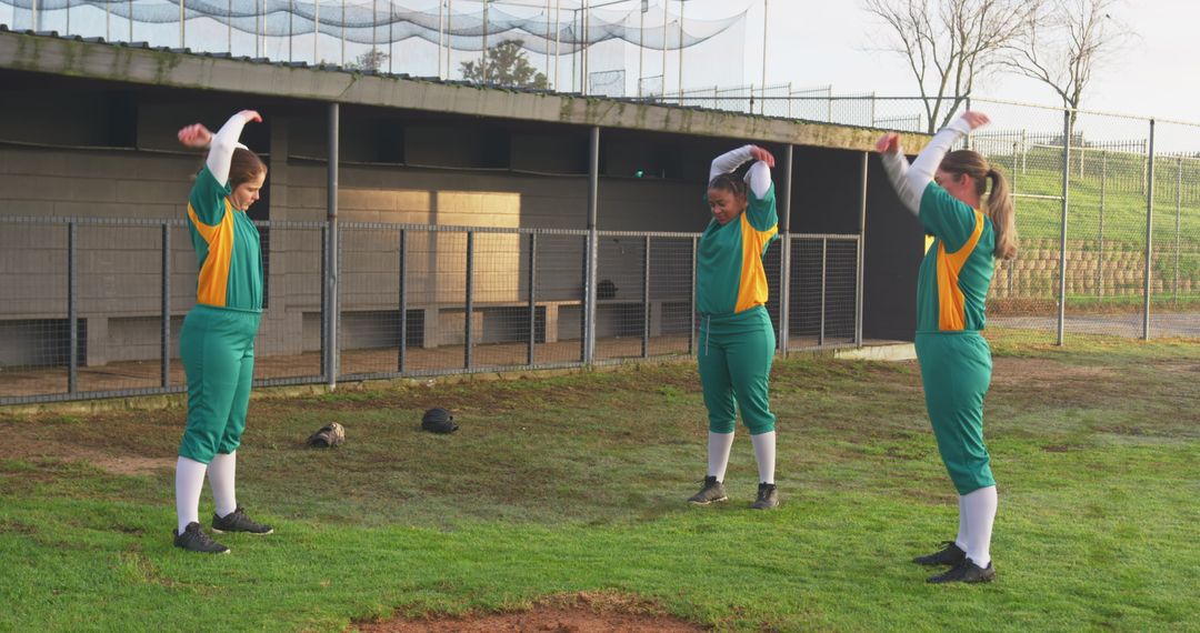 Female Softball Players Warming Up Before Game