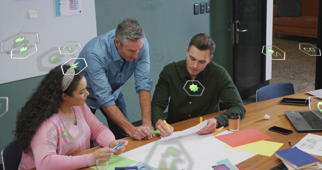 Team Collaborating and Sketching Product Concepts During Brainstorming Session