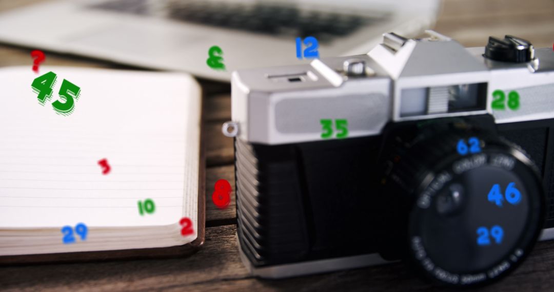 Creative Desk With Vintage Camera and Laptop Interface Effects