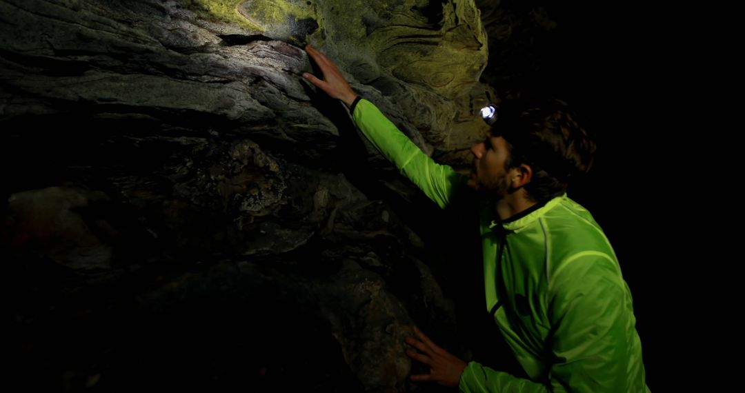 Man Exploring Dark Cave with Headlamp at Night - Free Images, Stock Photos and Pictures on Pikwizard.com