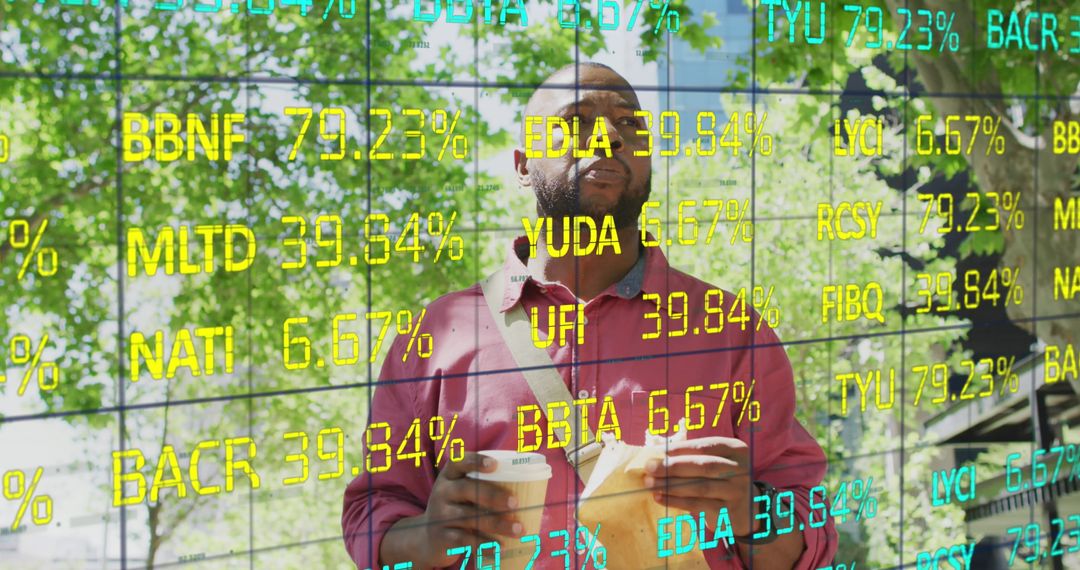 Man Holding Coffee Beneath Digital Stock Ticker in Green Urban Area