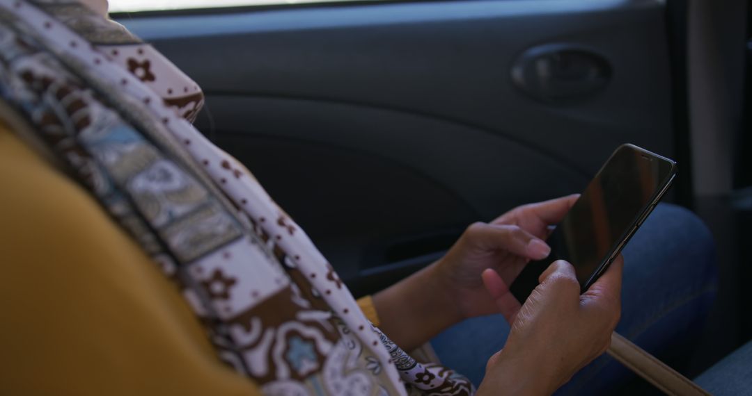 Woman Using Smartphone while Traveling by Car - Free Images, Stock Photos and Pictures on Pikwizard.com