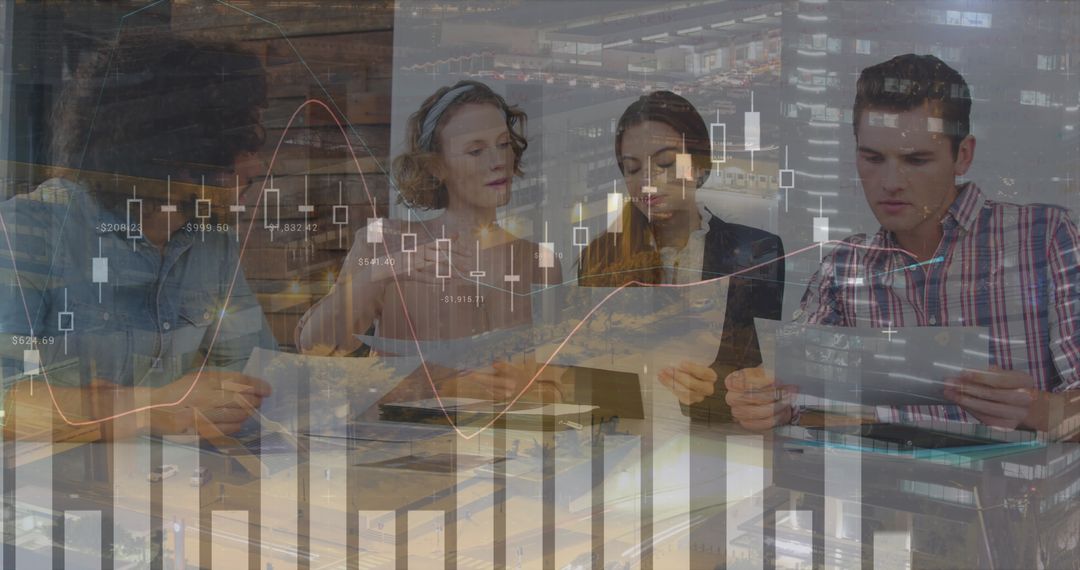Diverse Business Team Analyzing Financial Data with Graphs